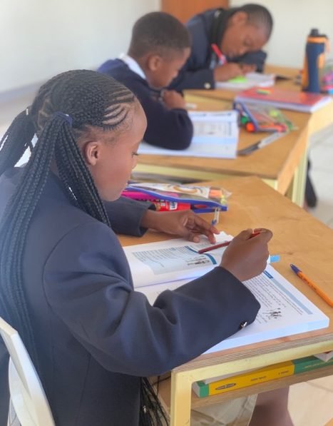 Learners studying in class